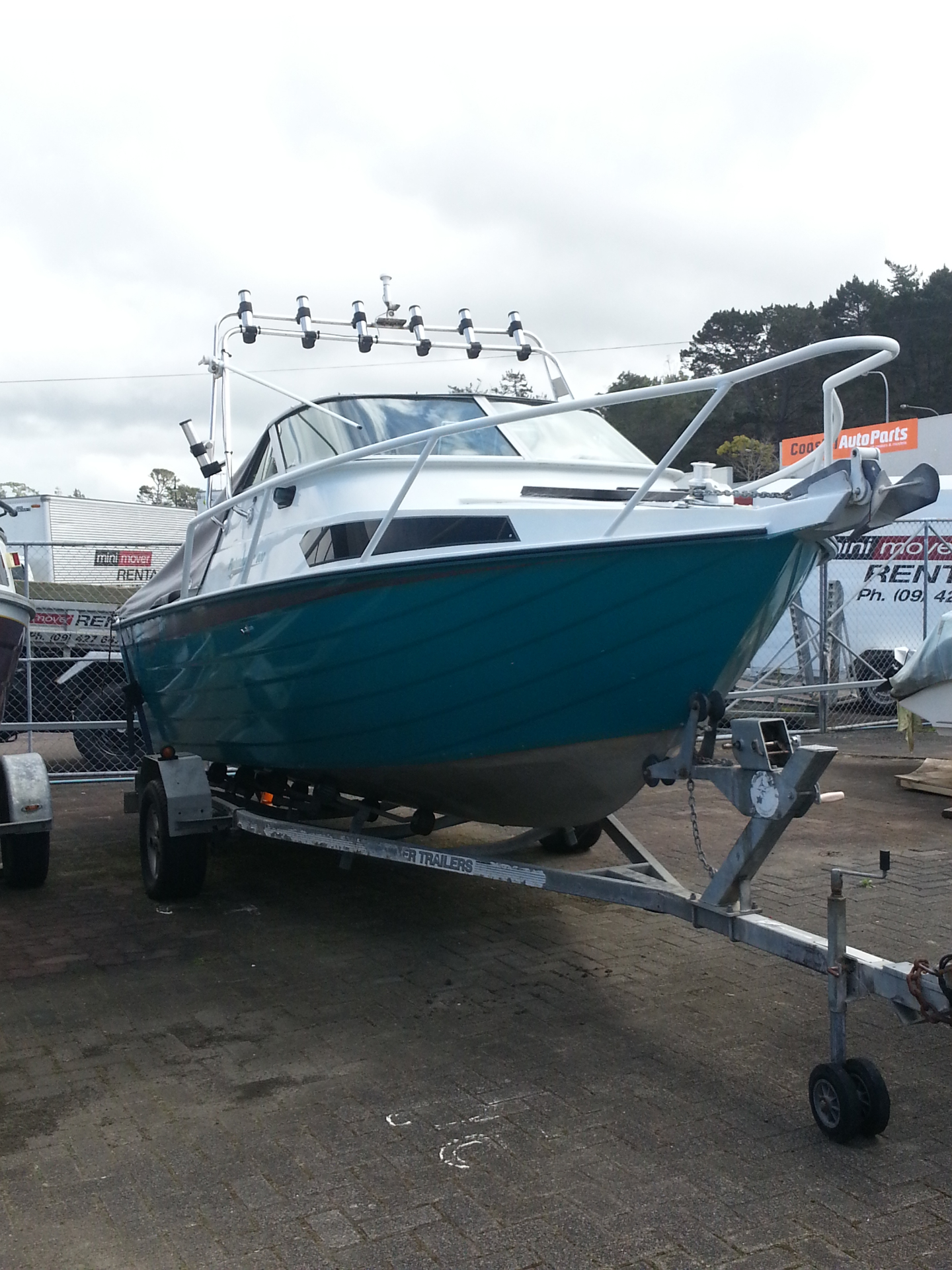 White launch on a trailer ready for LPG service